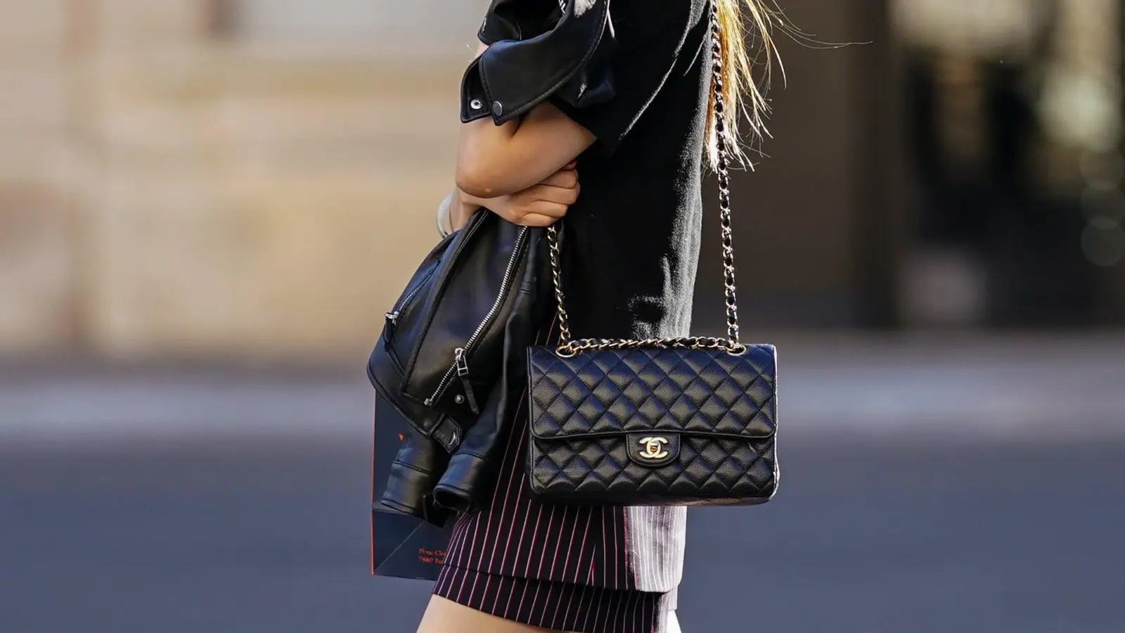 Chanel Classic Flap bag in black quilted leather with gold CC turn-lock clasp and chain strap